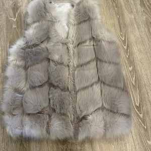 WOMEN NEW FAUX FUR JACKET FROM EUROPE. GOT OT FOR MY BIRTHDAY AND DIDNT FIT ME.